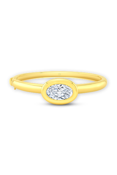 Oval Cut Diamond Bezel Bangle in Yellow Gold